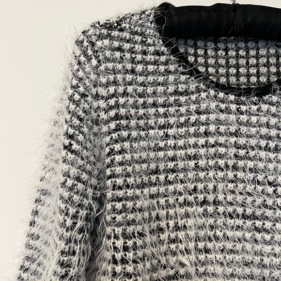 Fuzzy black and white sweater. - Picture 1 of 4